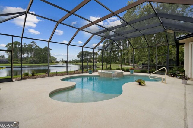 2491 Isles Of St Marys Way, Saint Marys, GA 31558 - view of pool featuring a water view, a patio area, a pool with connected hot tub, and a lanai
