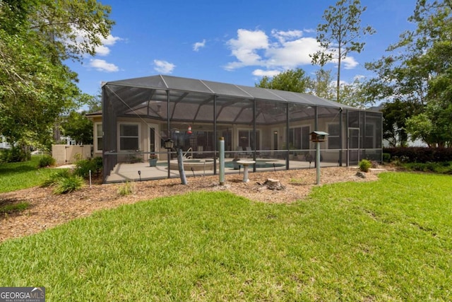 2491 Isles Of St Marys Way, Saint Marys, GA 31558 - rear view of house with an outdoor pool, a lawn, a patio, and a lanai