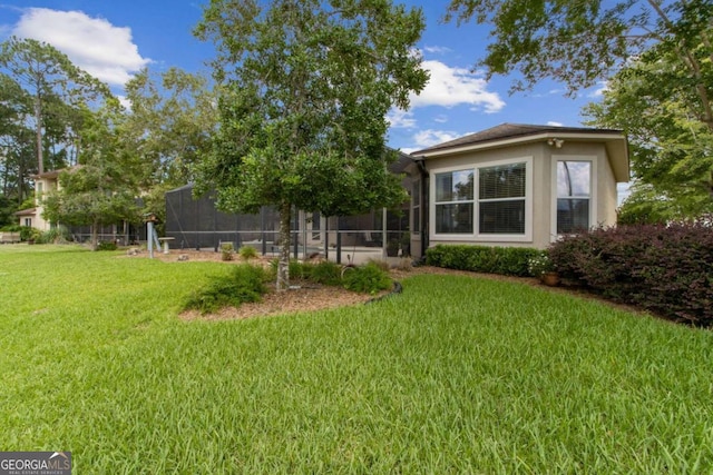 2491 Isles Of St Marys Way, Saint Marys, GA 31558 - view of grassy yard featuring a lanai