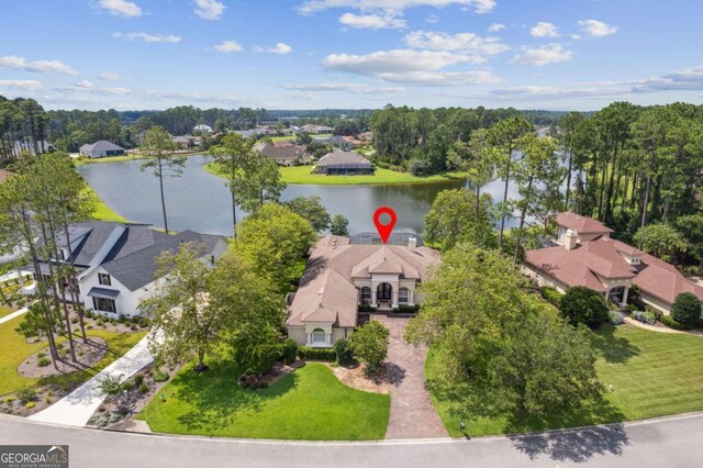 drone / aerial view with a water view