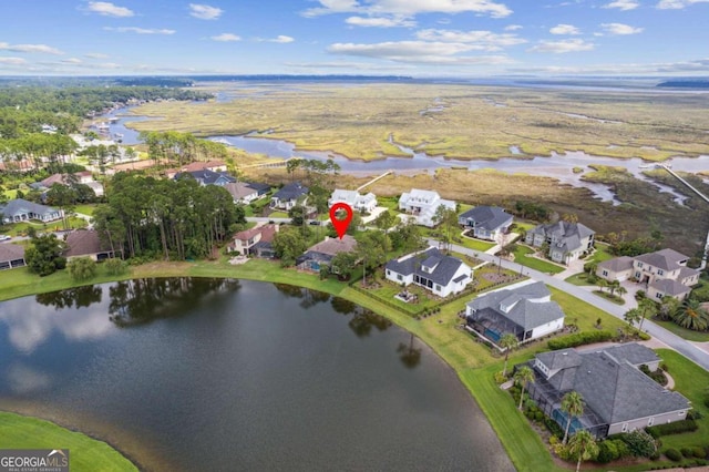 drone / aerial view featuring a water view