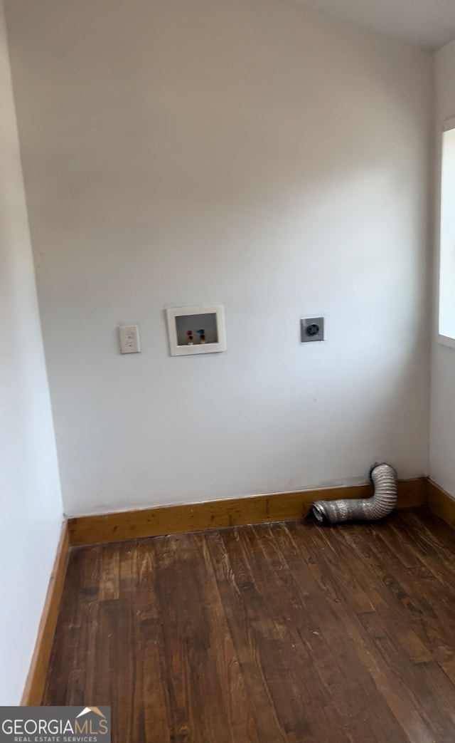 clothes washing area featuring hookup for a washing machine, dark hardwood / wood-style flooring, and hookup for an electric dryer