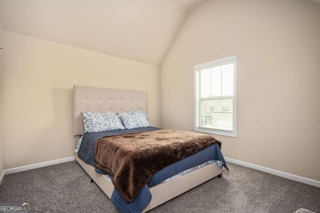 bedroom with carpet and vaulted ceiling