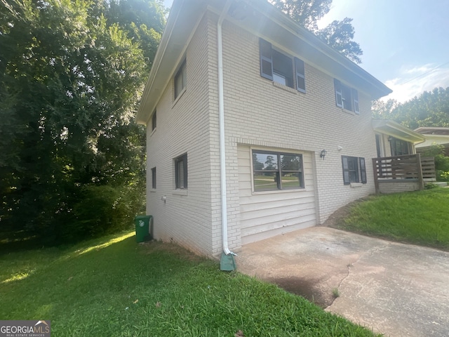 view of property exterior featuring a yard