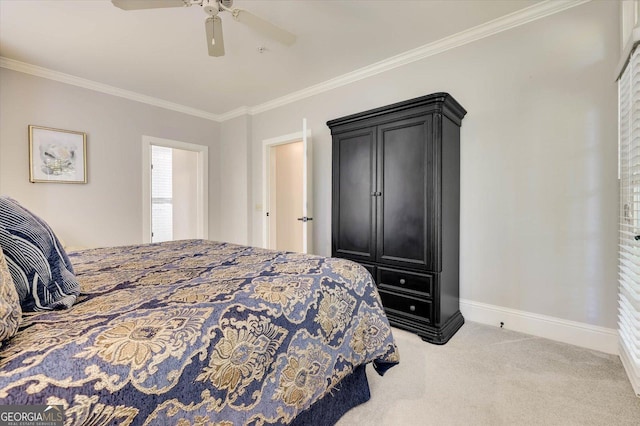 bedroom featuring ceiling fan, crown molding, and light carpet