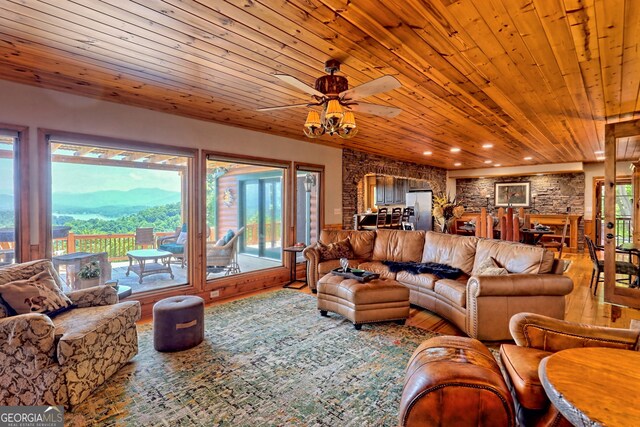 dining room with wood ceiling and light wood-type flooring