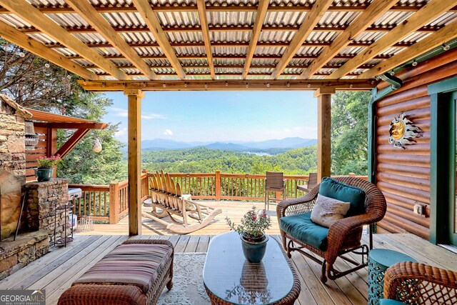 interior space featuring a mountain view and a pergola