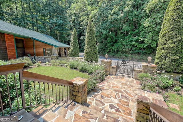 exterior space with a patio and a yard