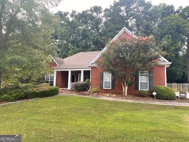 view of front of house with a front lawn