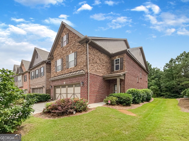 view of home's exterior with a garage and a lawn