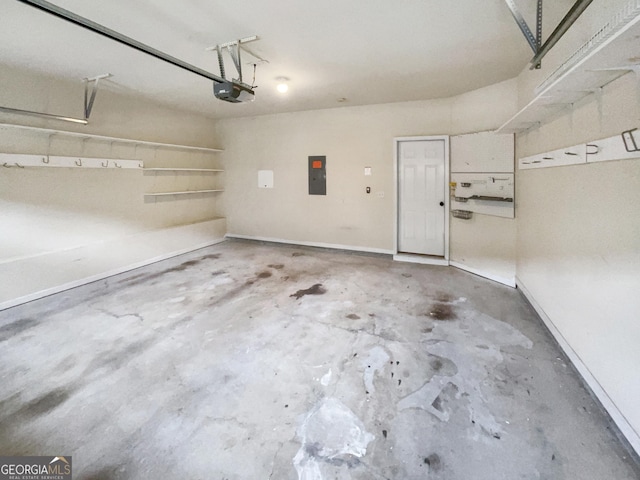 garage featuring electric panel and a garage door opener