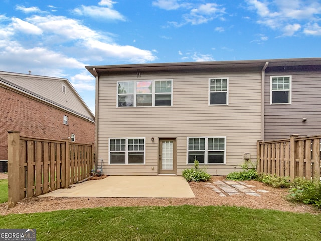 back of house featuring a patio area