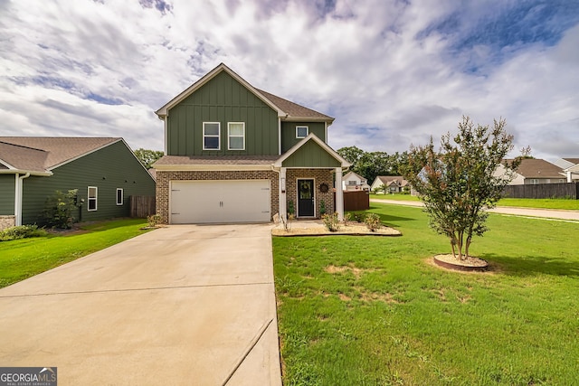 craftsman-style home featuring a garage and a front yard