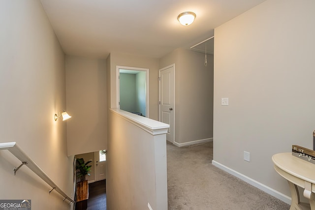 corridor featuring carpet floors