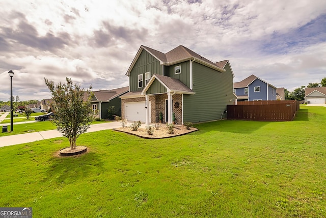 craftsman-style home with a garage and a front lawn