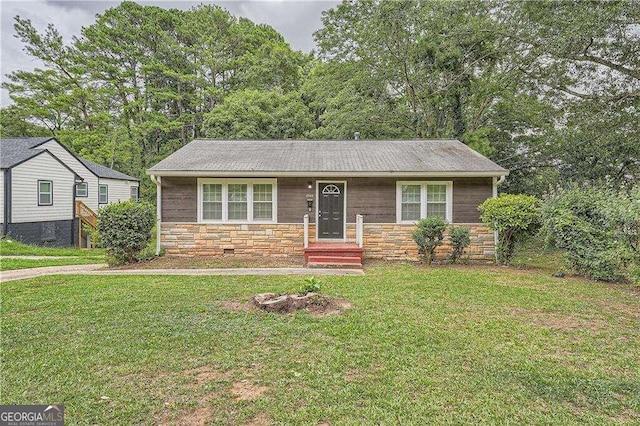 single story home with a front yard