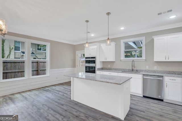 kitchen with sink, white cabinetry, and appliances with stainless steel finishes