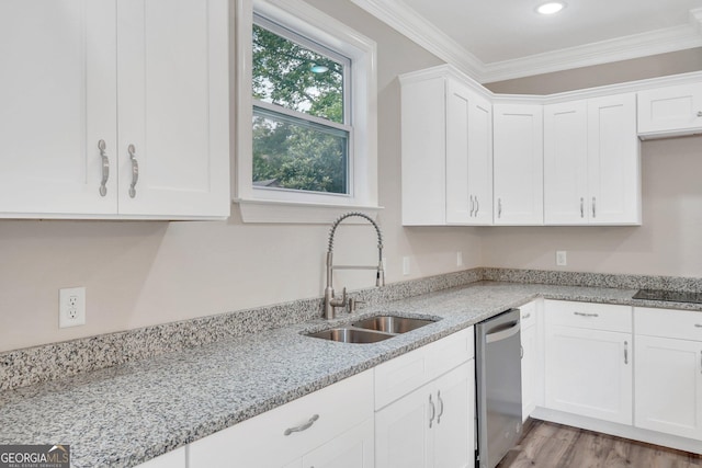 kitchen featuring white cabinets, sink, ornamental molding, light stone counters, and stainless steel dishwasher