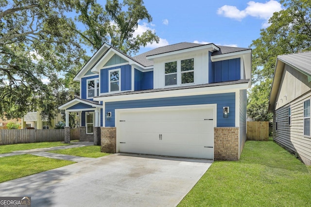 view of front facade featuring a garage and a front yard