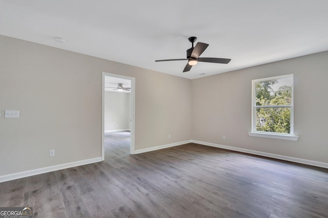 unfurnished room with light hardwood / wood-style flooring and ceiling fan