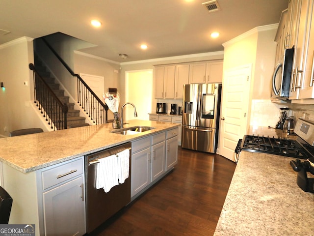 kitchen with crown molding, stainless steel appliances, dark hardwood / wood-style flooring, and sink