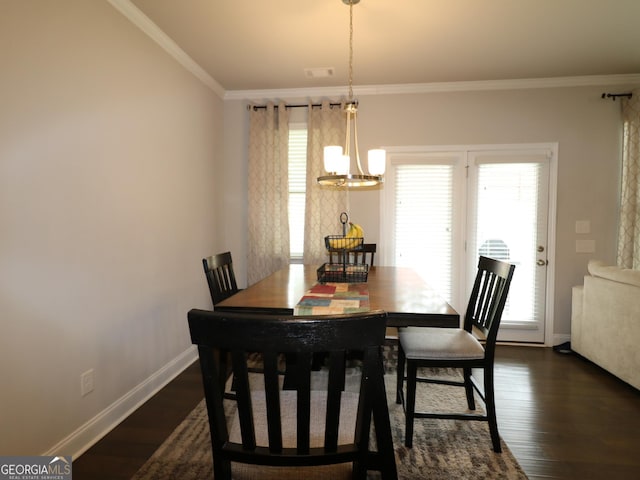 dining room featuring dark hardwood / wood-style floors and plenty of natural light