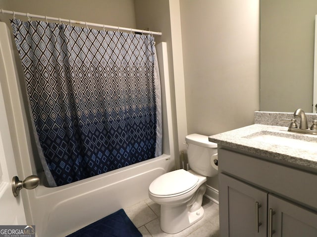 full bathroom featuring shower / tub combo with curtain, vanity, tile patterned floors, and toilet