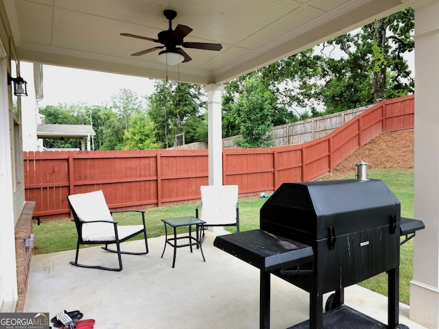 view of patio / terrace featuring a grill and ceiling fan