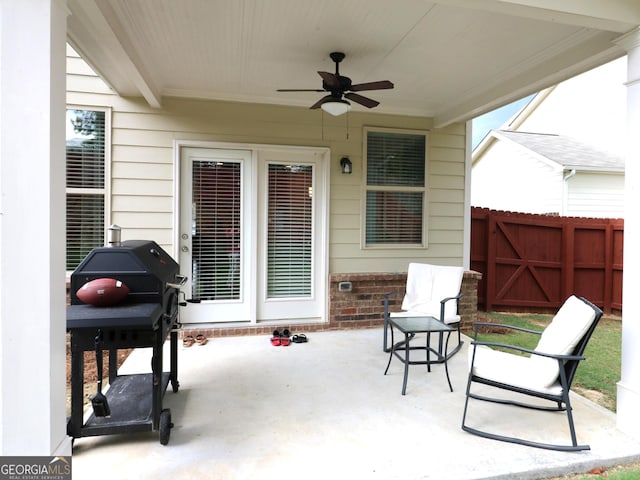 view of patio / terrace featuring ceiling fan