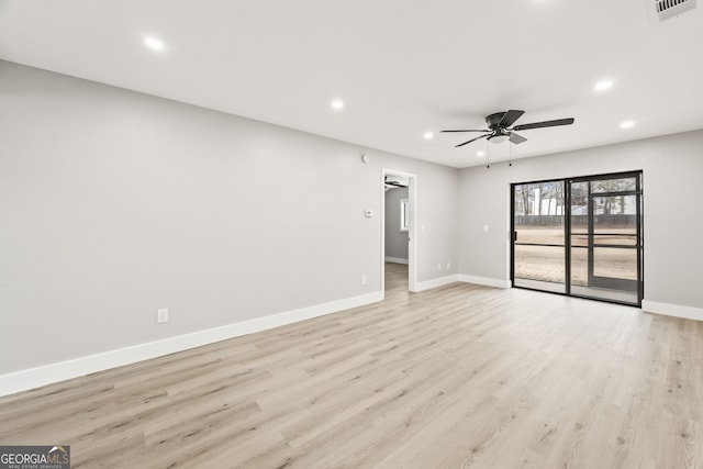 unfurnished room with light hardwood / wood-style floors and ceiling fan