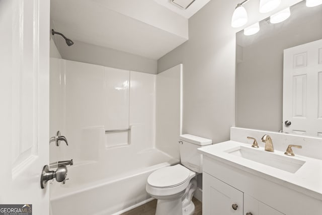 full bathroom with vanity, shower / tub combination, and toilet