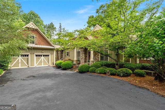 craftsman house featuring a garage