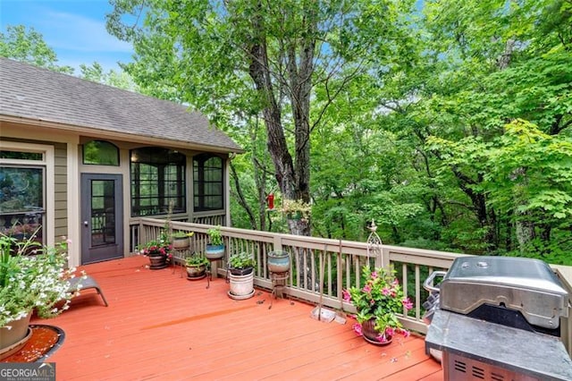 wooden deck with area for grilling