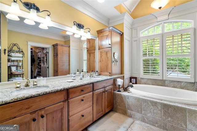 bathroom with tiled bath, tile patterned floors, ornamental molding, and dual bowl vanity