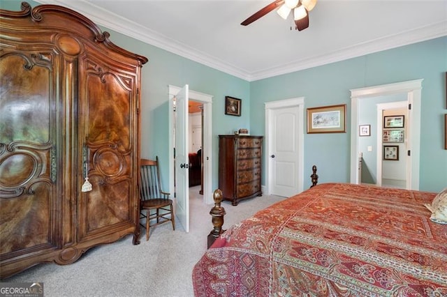 bedroom with light colored carpet, crown molding, and ceiling fan