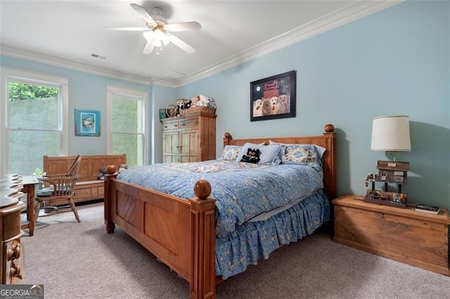 bedroom with light colored carpet, crown molding, and ceiling fan