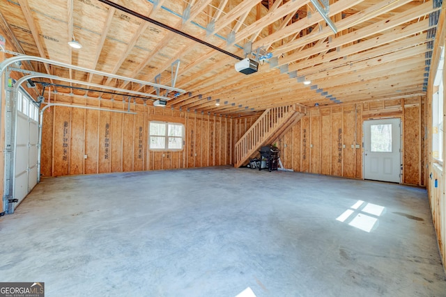 garage featuring a garage door opener