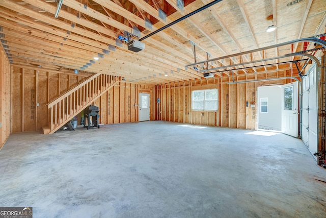 garage featuring a garage door opener