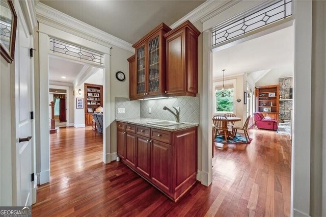 dining area featuring dark hardwood / wood-style flooring and a chandelier