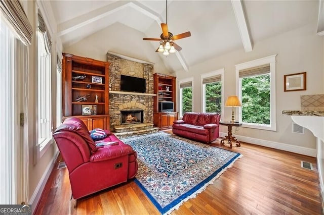 kitchen with tasteful backsplash, sink, dark hardwood / wood-style floors, light stone countertops, and ornamental molding