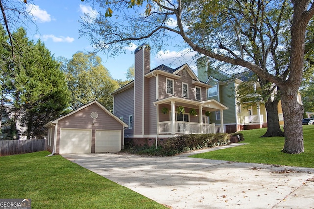 view of front of house featuring covered porch, a garage, and a front lawn