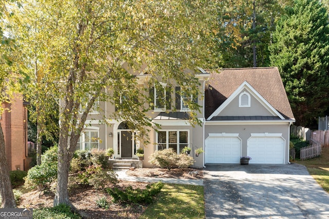 view of front of property with a garage