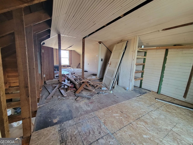 interior space featuring vaulted ceiling