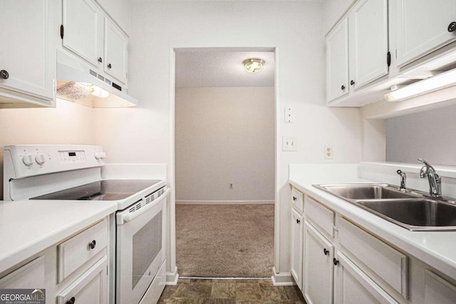 kitchen with white cabinetry, sink, dark colored carpet, and white range with electric cooktop