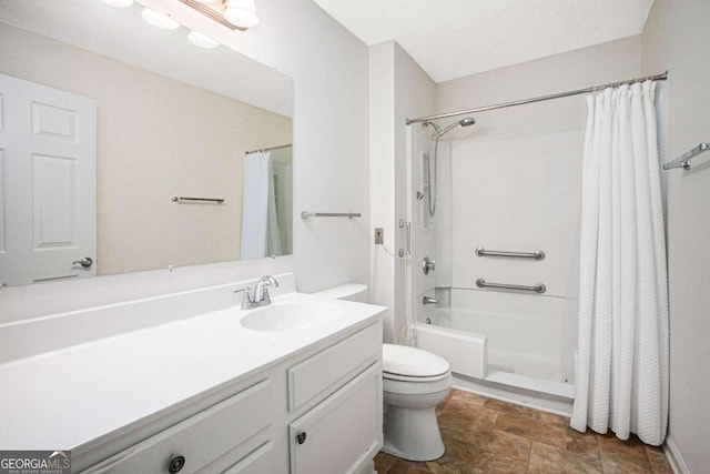 full bathroom with vanity, toilet, and shower / bath combo