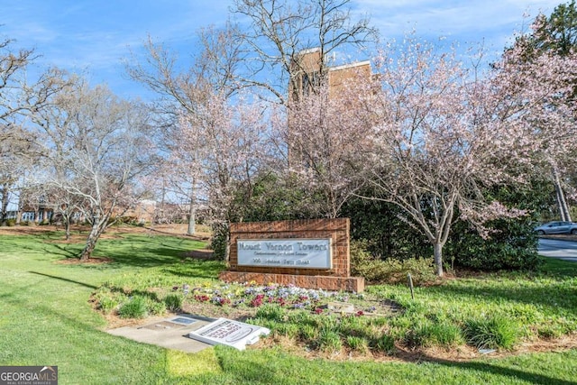 surrounding community featuring a yard