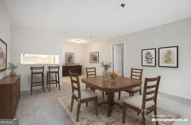 dining space with light colored carpet