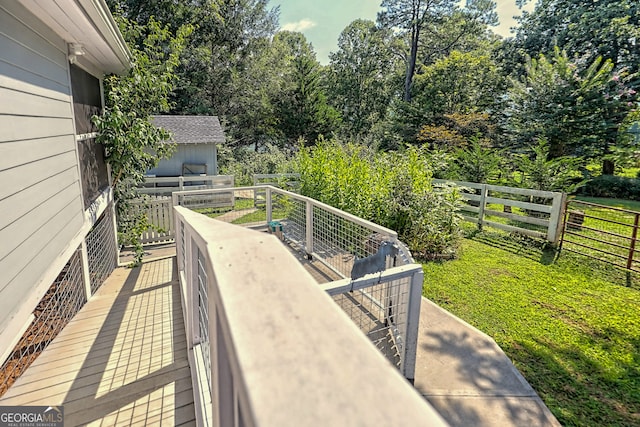 deck featuring a yard