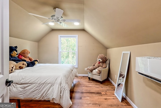 bedroom with wood-type flooring, vaulted ceiling, and ceiling fan