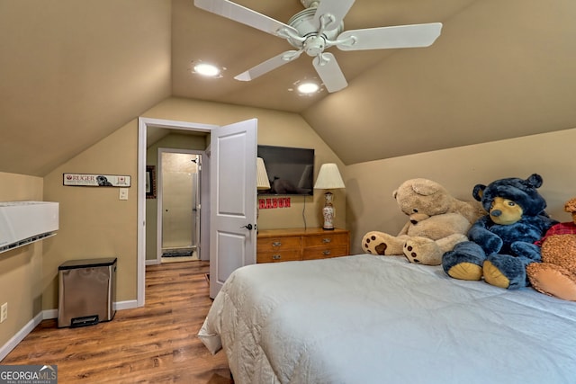 bedroom with wood-type flooring, ceiling fan, and lofted ceiling